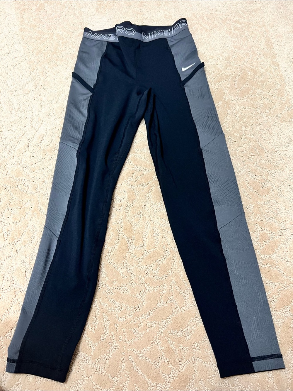 Nike  2 pair 
Women’s 
' Black and Gray Performance Leggings